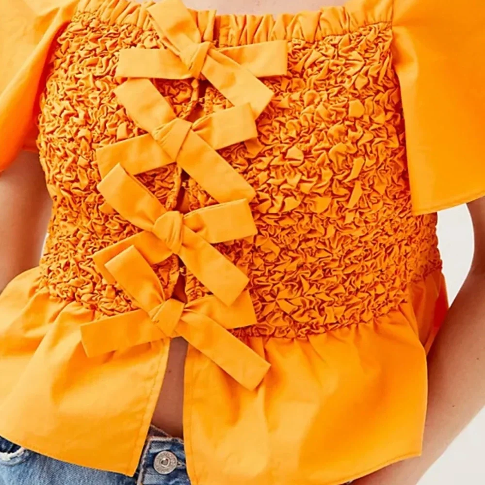 *Anthropologie Smocked Bow Tie Top Size Medium